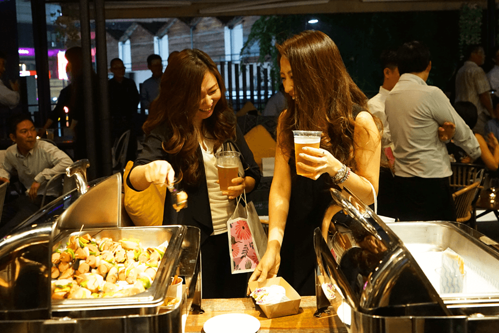 Guests enjoying the buffet at an event at The KL Journal Hotel
