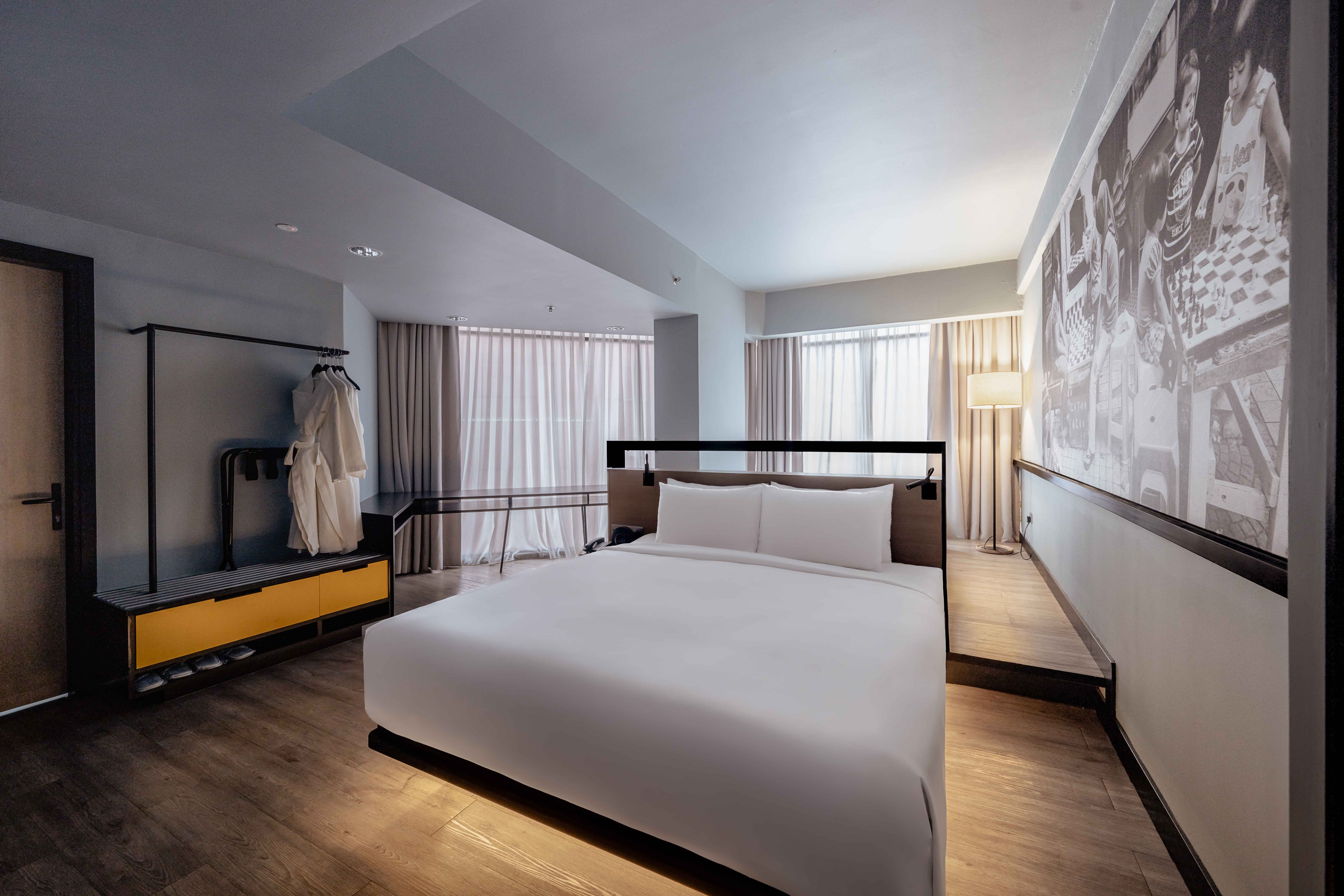 Spacious & chic Family Room room with city views at KL Journal Hotel