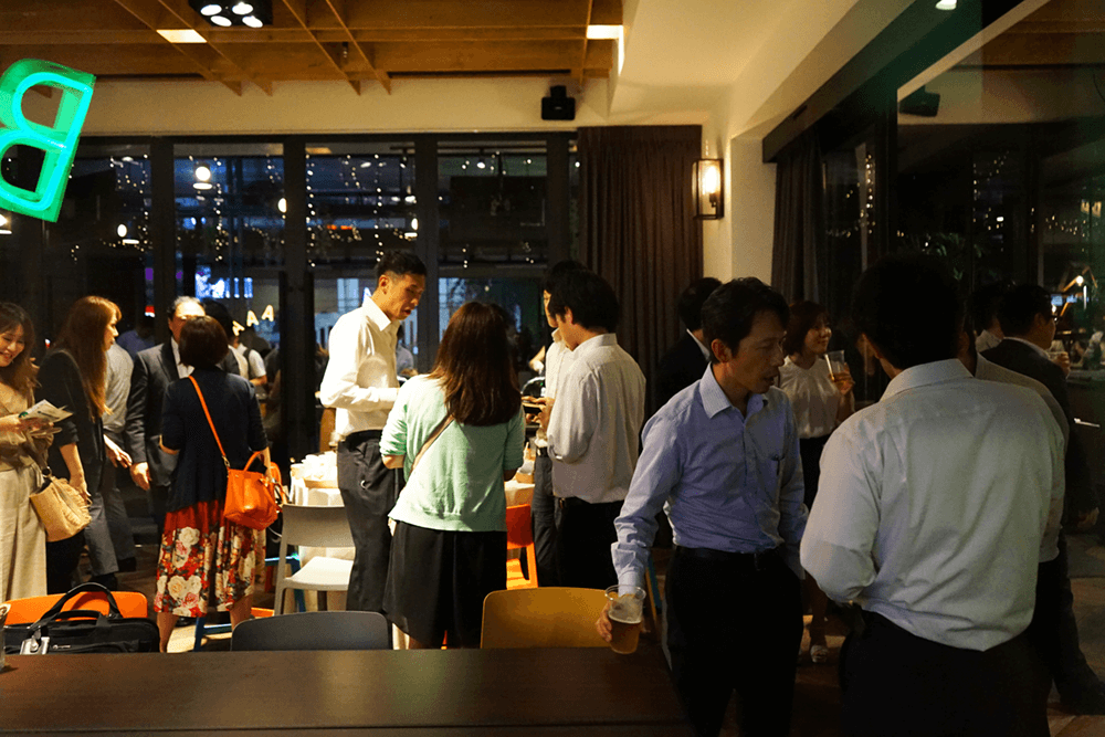 Guests at a night time event at KL Journal Hotel