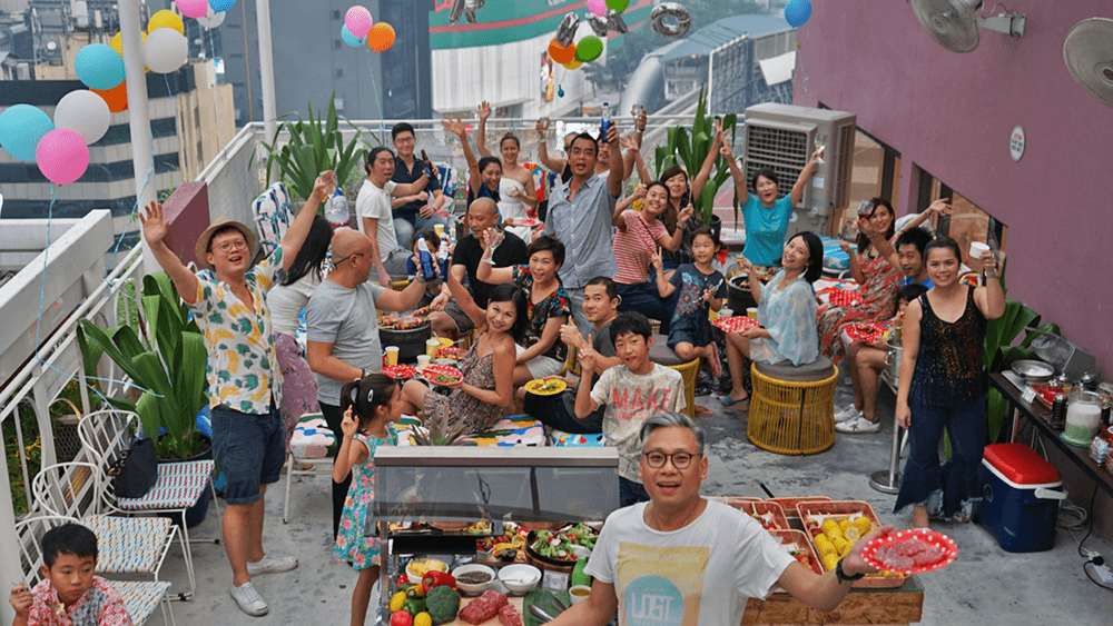 Guests enjoying a daytime event at the rooftop event space