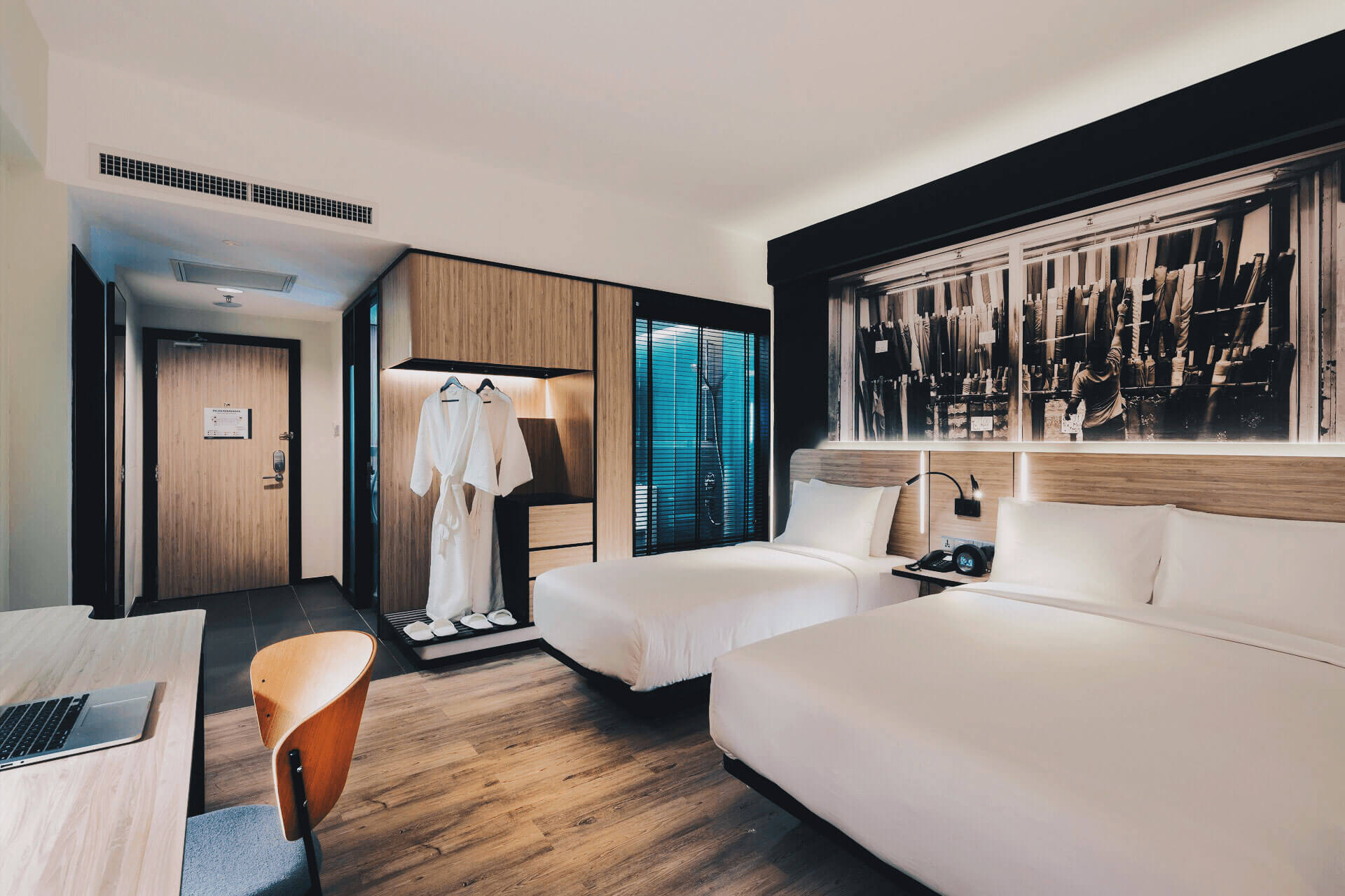 Chic and modern Deluxe Triple room at KL Journal Hotel