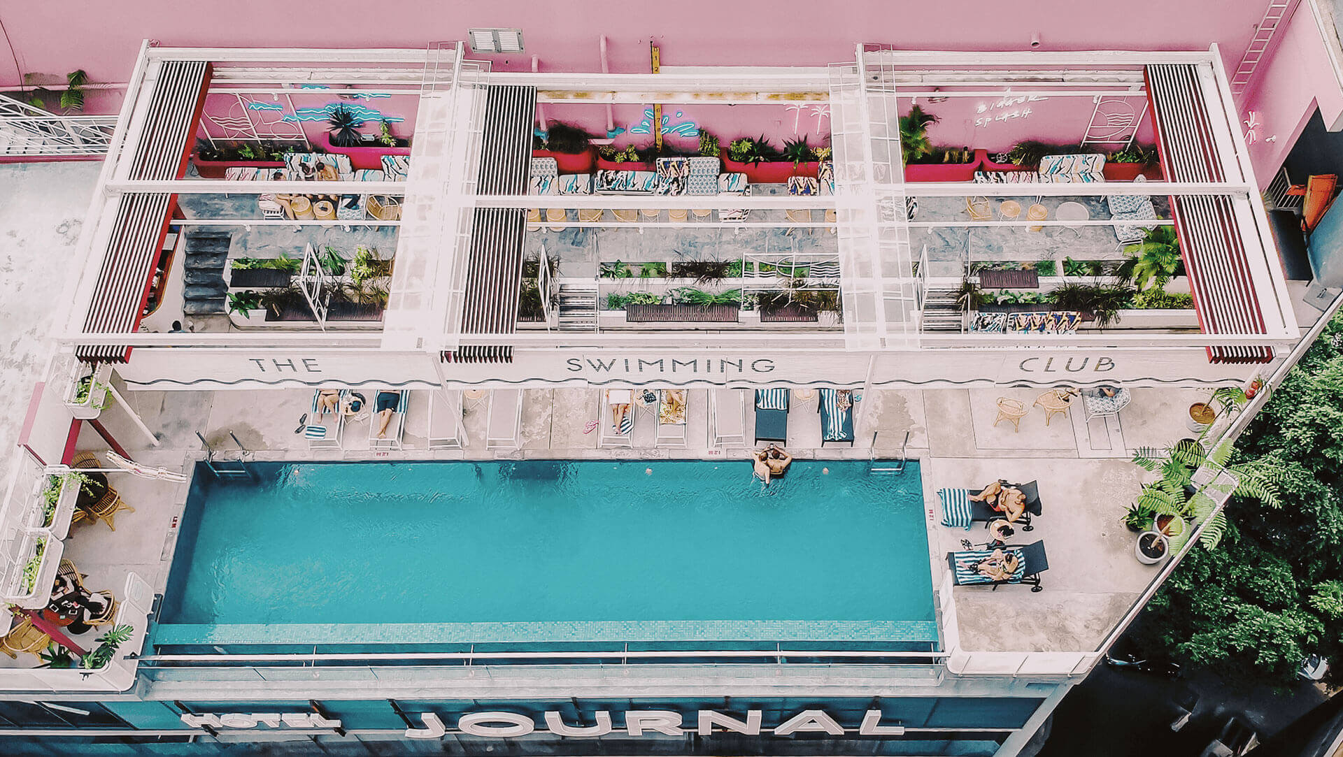 Aerial view of the chic Swimming Club with infinity pool at KL Journal Hotel