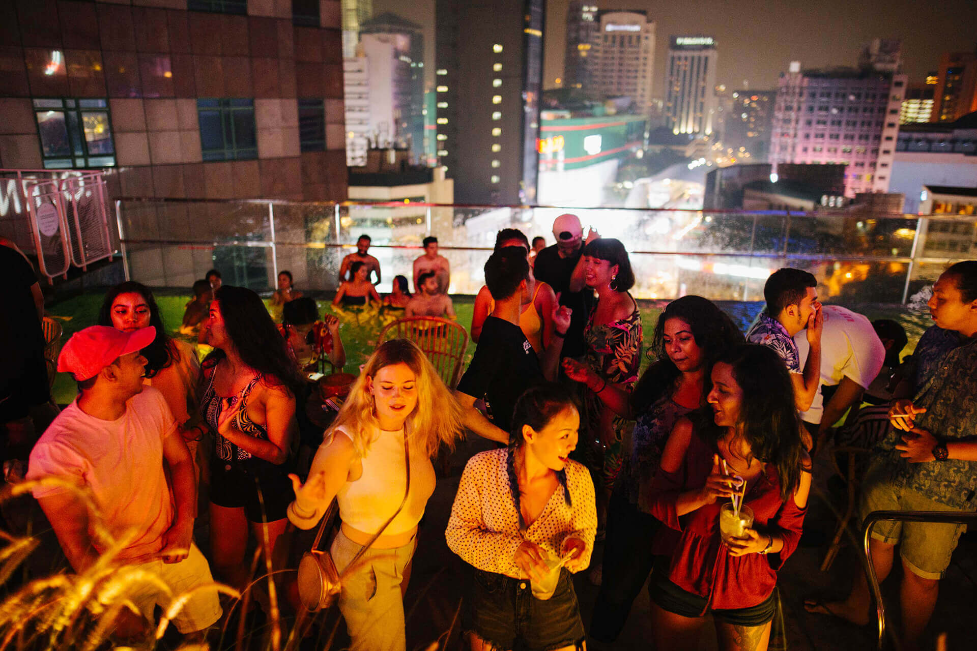 Group of people partying at the Swimming Club