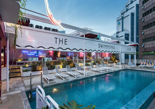 Evening view of the rooftop bar at KL Journal Hotel